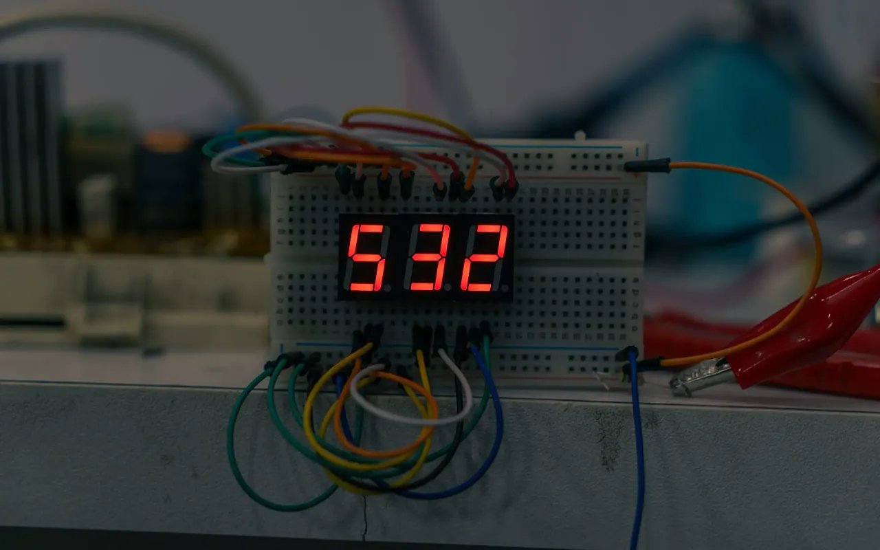 ESP32-C3 industrial sensor prototype showing temperature and humidity readings